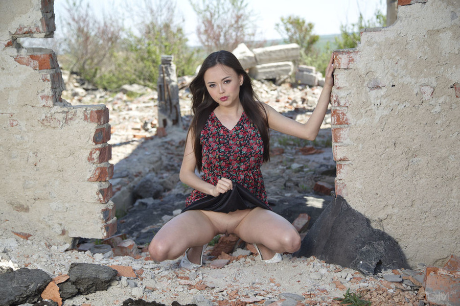Petite Asian gets naked in the rubbles, fin - XXX Dessert - Picture 2
