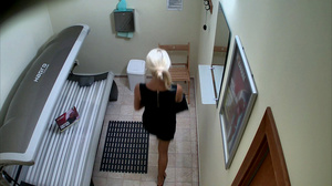 Glamorous long-legged blonde in sexy short black dress - Picture 1