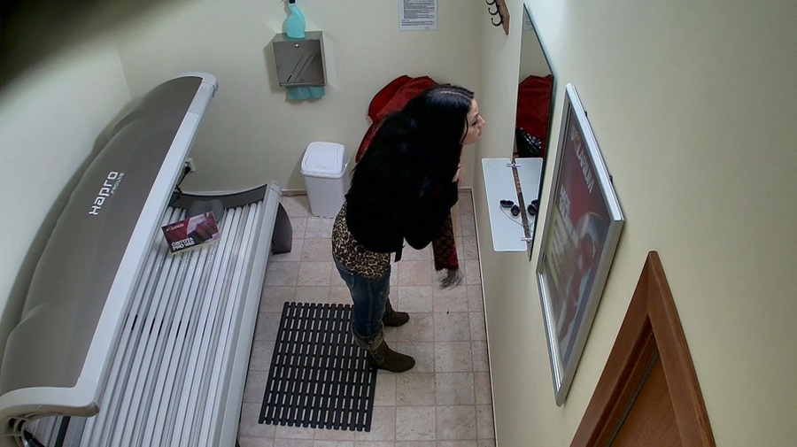 Slender brunette undresses her casual outfit in the solarium - XXXonXXX - Pic 1