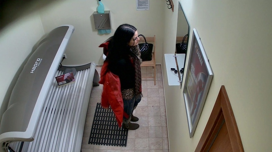 Slender brunette undresses her casual outfit in the solarium - XXXonXXX - Pic 8
