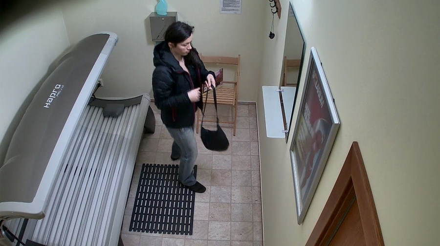 Brunette undresses jeans and jacket on the hidden camera - XXXonXXX - Pic 1