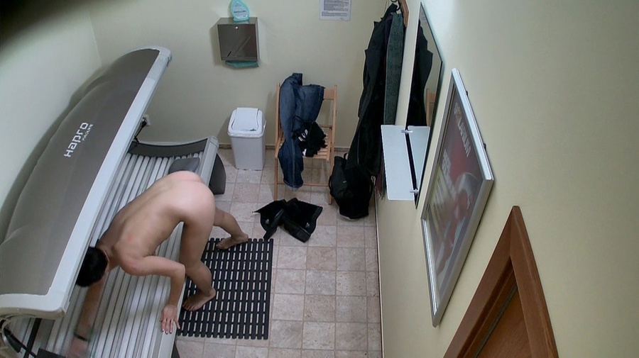 Tall milf with short dark hair and long legs in the solarium - XXXonXXX - Pic 7