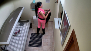 Brunette on high heels takes off tight pink outfit - Picture 1