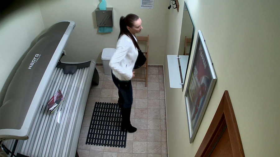 Tall brunette with a ponytail looks sexy in a white jacket - XXXonXXX - Pic 1