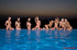Luscious hotties gets their steaming hot bodies wet in a pool while they