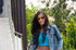 tanned brunette girl strips