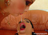 Two brunettes get to swap cum after bareback sex on orange couch!
