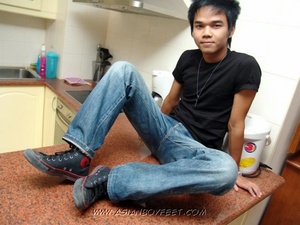 Handsome Asian stud takes off his black  - XXX Dessert - Picture 1
