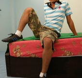 Hot Asian pose his skinny body on a green bed wearing his blue and white