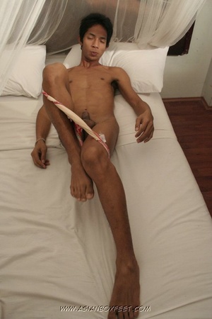 Asian stud lays down topless and display - XXX Dessert - Picture 3