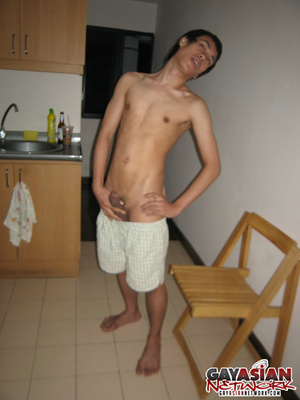Asian stud takes off his gray shorts the - Picture 13