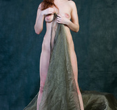 Young babe with pink nipples is posing hot with green shawl