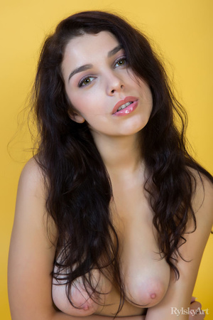Wonderful young brunette poses on juicy  - Picture 15