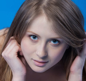 Steaming hot sex posing on blue back ground with silk shawl