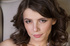 curly haired brunette with