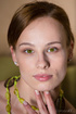 brunette green necklace poses