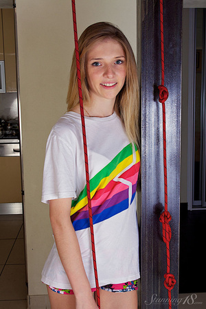 Blonde in rainbow t-shirt balance elagan - XXX Dessert - Picture 1