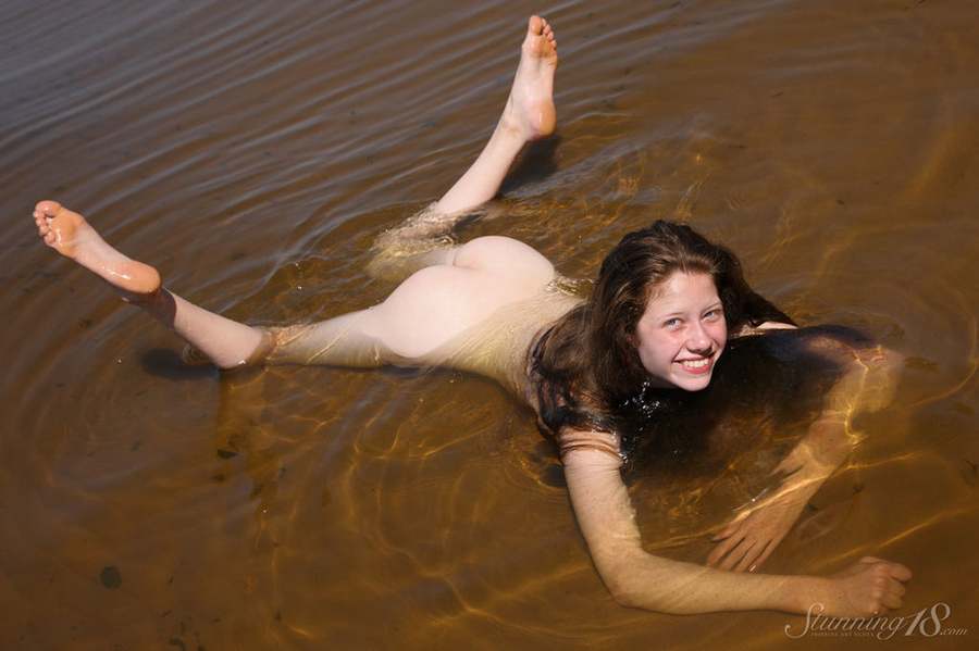 Brunette sexily plays in the shallow waters - XXX Dessert - Picture 1