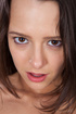 brunette slut poses naked