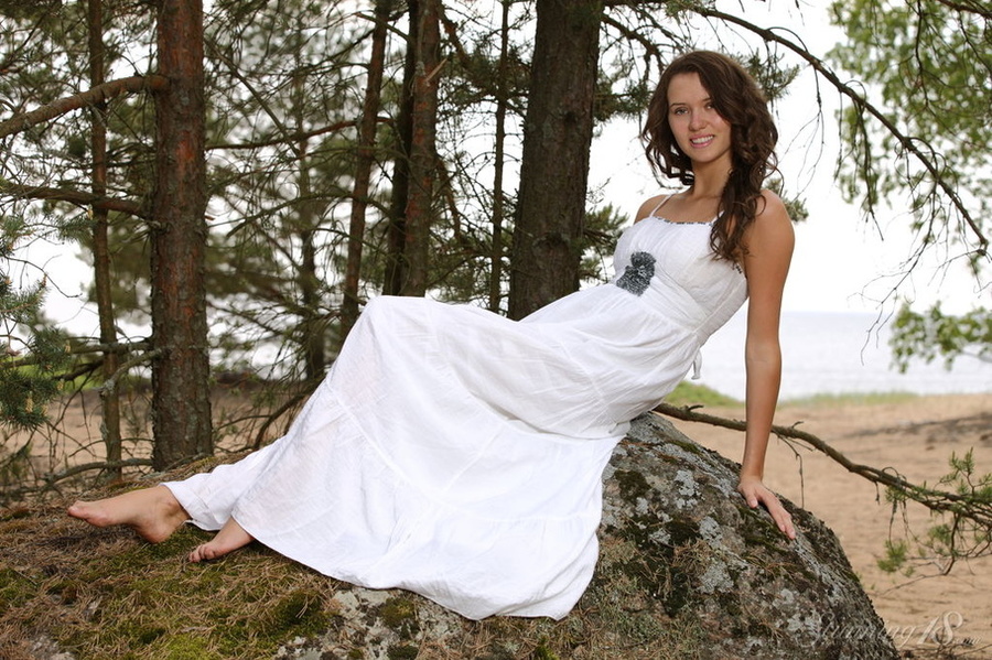 Curly haired brunette in white gown strips  - XXX Dessert - Picture 1