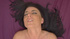Brunette hottie orgasming heavily while rubbing her shaved pussy