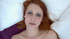 Tattooed red cutie fingering and rubbing her twat intensively