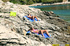 After sunbathing two brunettes in sexy swim suits getting nude and involved