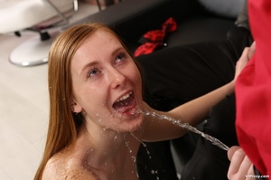 Redhead girl gets her tight little body drenched with hot piss - Picture 5