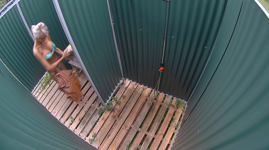 Slim ponytailed blondie with massive fake tits changing after pool - XXXonXXX - Pic 1