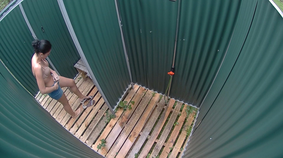 Brunette chick with hair knot taking shower in blue bikini - XXXonXXX - Pic 2