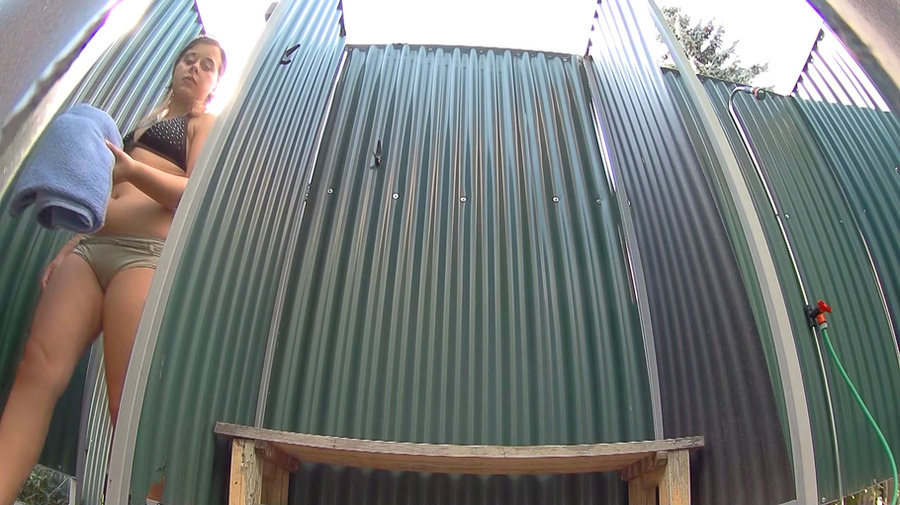 Brunette girl caught on spy-cam showering in the changing cabin - XXXonXXX - Pic 1
