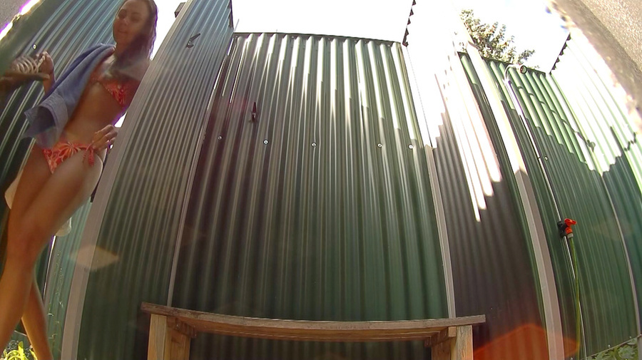 Spy cam shows us brunette gal with hair knot changing before pool - XXXonXXX - Pic 1