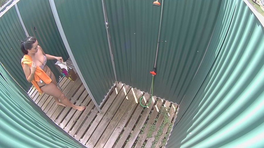 Curvy ponytailed brunette with natural juggs gets nude to change after pool - XXXonXXX - Pic 1