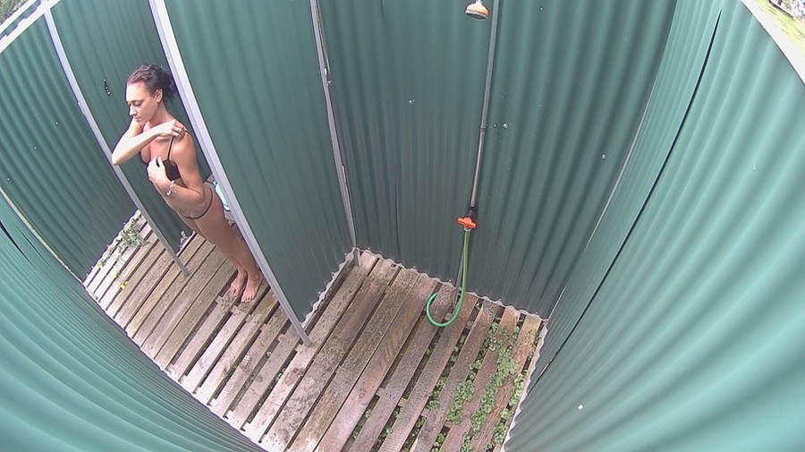 Slim tanned brunette with tattoos showering and dressing after swimming - XXXonXXX - Pic 7