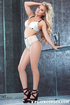 blonde girl bends over