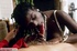 Stunning black chick displays her indulging body wearing her white bra,