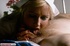 Steaming hot nurse in white uniform, black stockings and white high heels