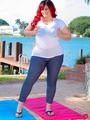 Red haired fat chick takes off her white - Picture 1