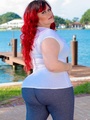 Red haired fat chick takes off her white - Picture 2