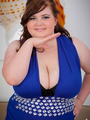 Cute BBW displays her big fat body in blue dress, black - Picture 1