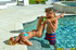 Blonde MILF sheds hot blue bikini to engage in sensational poolside sex.