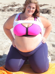 Alluring BBW displays her extra large body at the beach - Picture 1