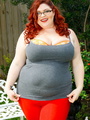 Red haired plumper strips off her gray - Picture 1
