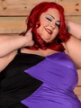 Red haired BBW takes off her black and - Picture 1