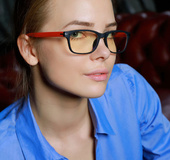 Pretty blonde in blue shirt and black skirt shows sexy tits and round