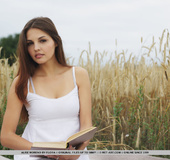 Stunning brunette in white dress flaunts shaved pussy, sexy ass and tits