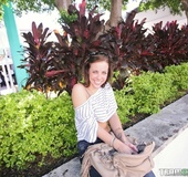 Captivating blue-eyed brunette shows what she has in public, more on the