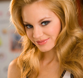 Elegant blonde in a white too and panties posing her curvy butt enthusiastically