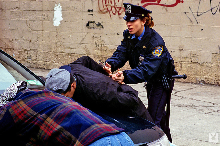 Naughty police officer plays around with her police stick between juicy breasts - XXXonXXX - Pic 4