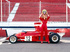 Buxom red-haired, blue-eyed racing slut with red Mustang will make anyone's